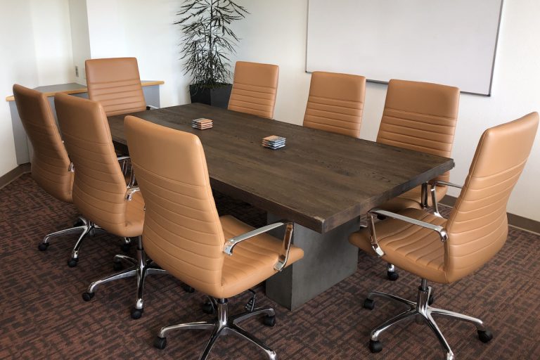 Office Boardroom with 7 chairs and a meeting table