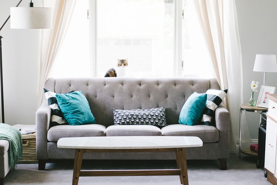 Grey sofa shop with turquoise cushions